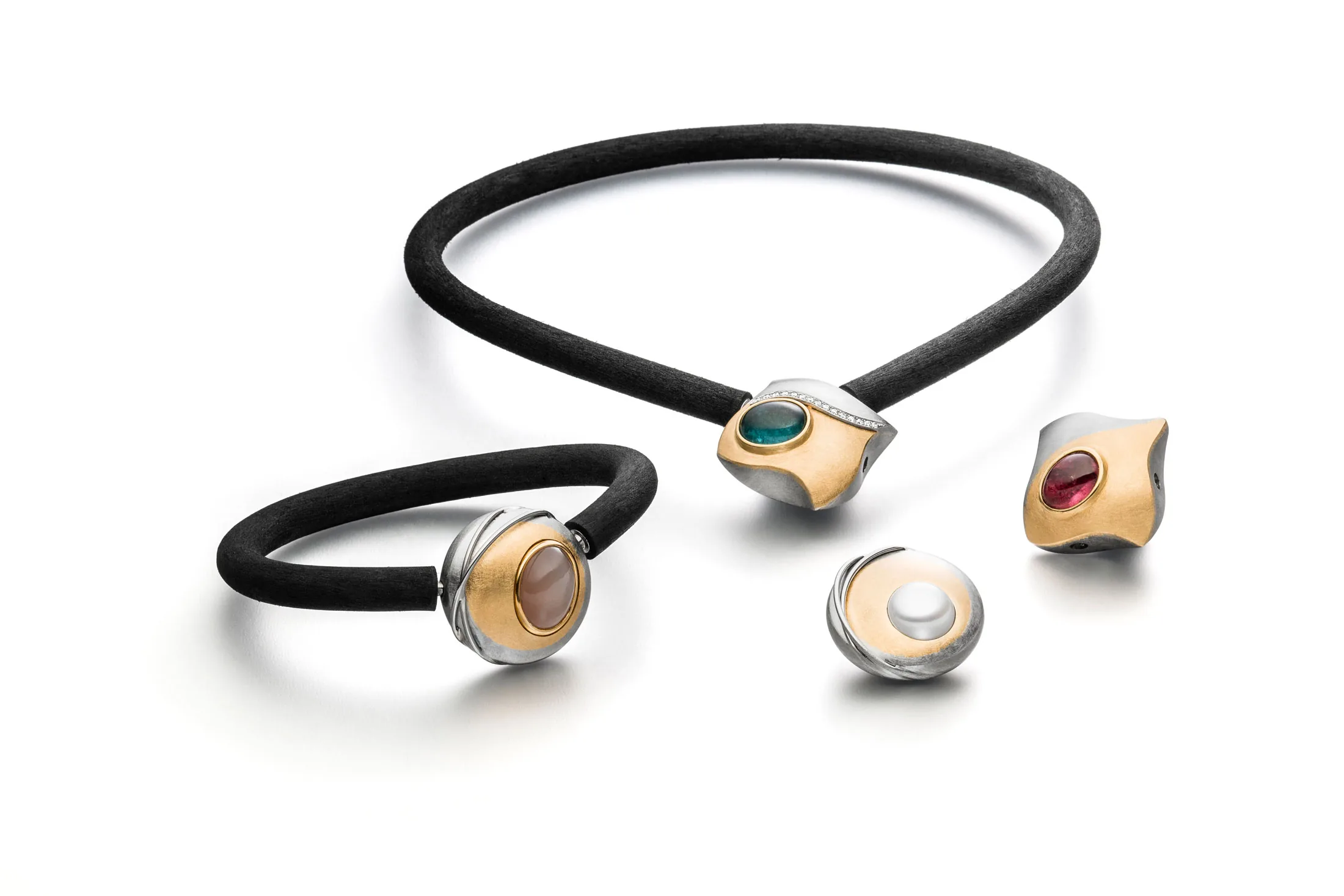 Rubber necklace and bracelet with various interchangeable gemstone clasps